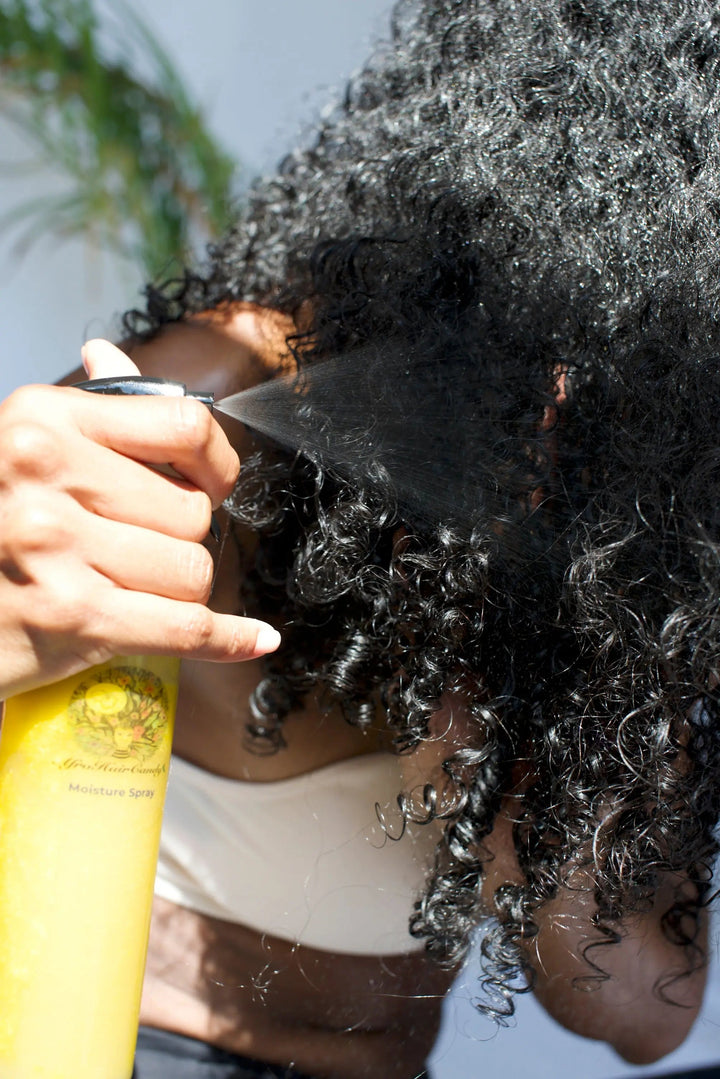 AfroHairCandy Moisture Growth Spray with aloe vera coconut water and Chebe
