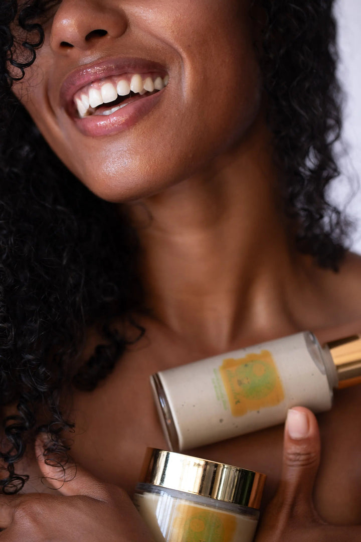 Mbembi Natural Intimate Care Set for Women pictured with strawberries and carrots, showcasing natural vitamin C content